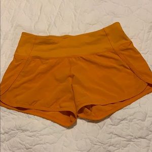 Lululemon Orange Speed up Shorts